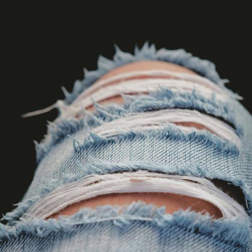 Ripped Jeans and Middle Finger