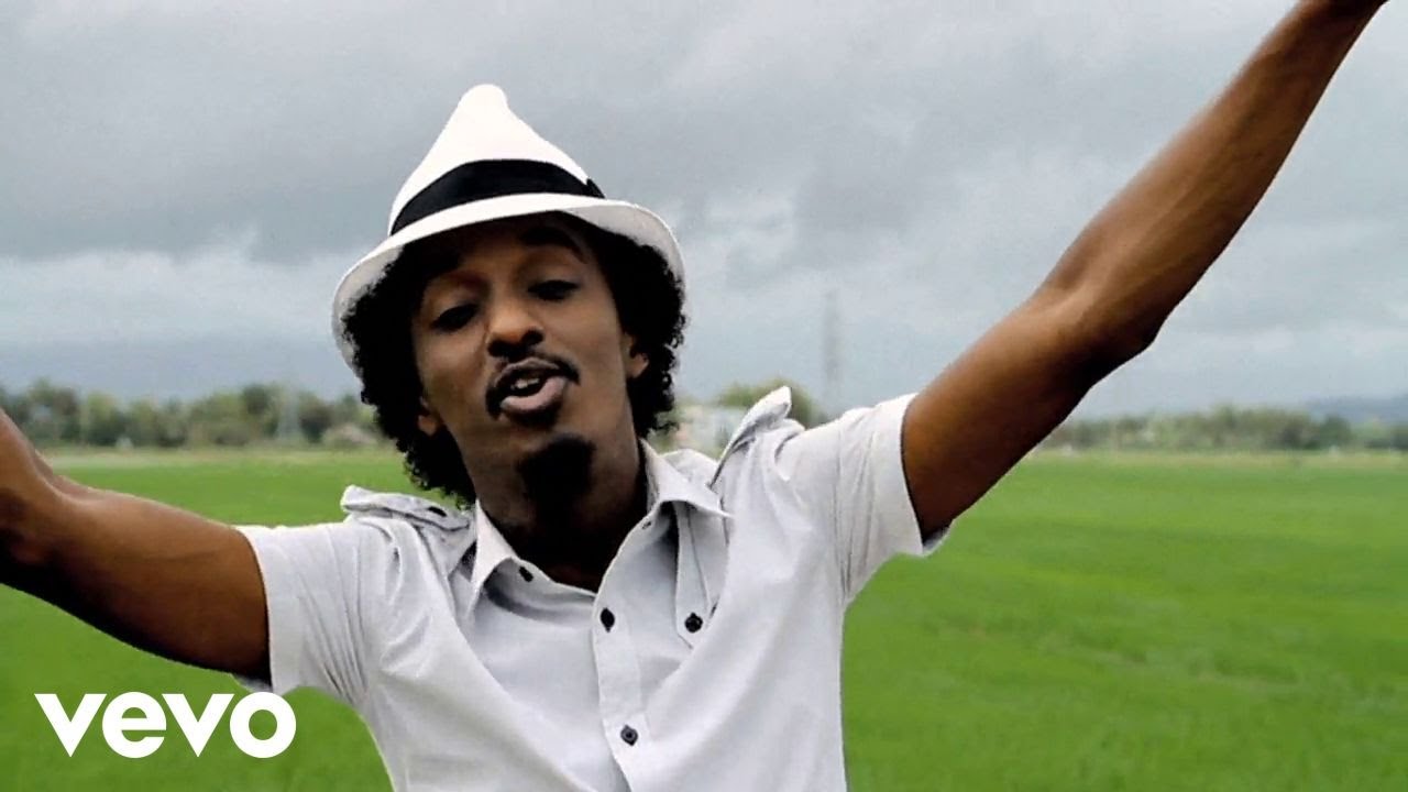 K'naan&张学友&张靓颖《Wavin' Flag (Coca-Cola Chinese Celebration Mix)》